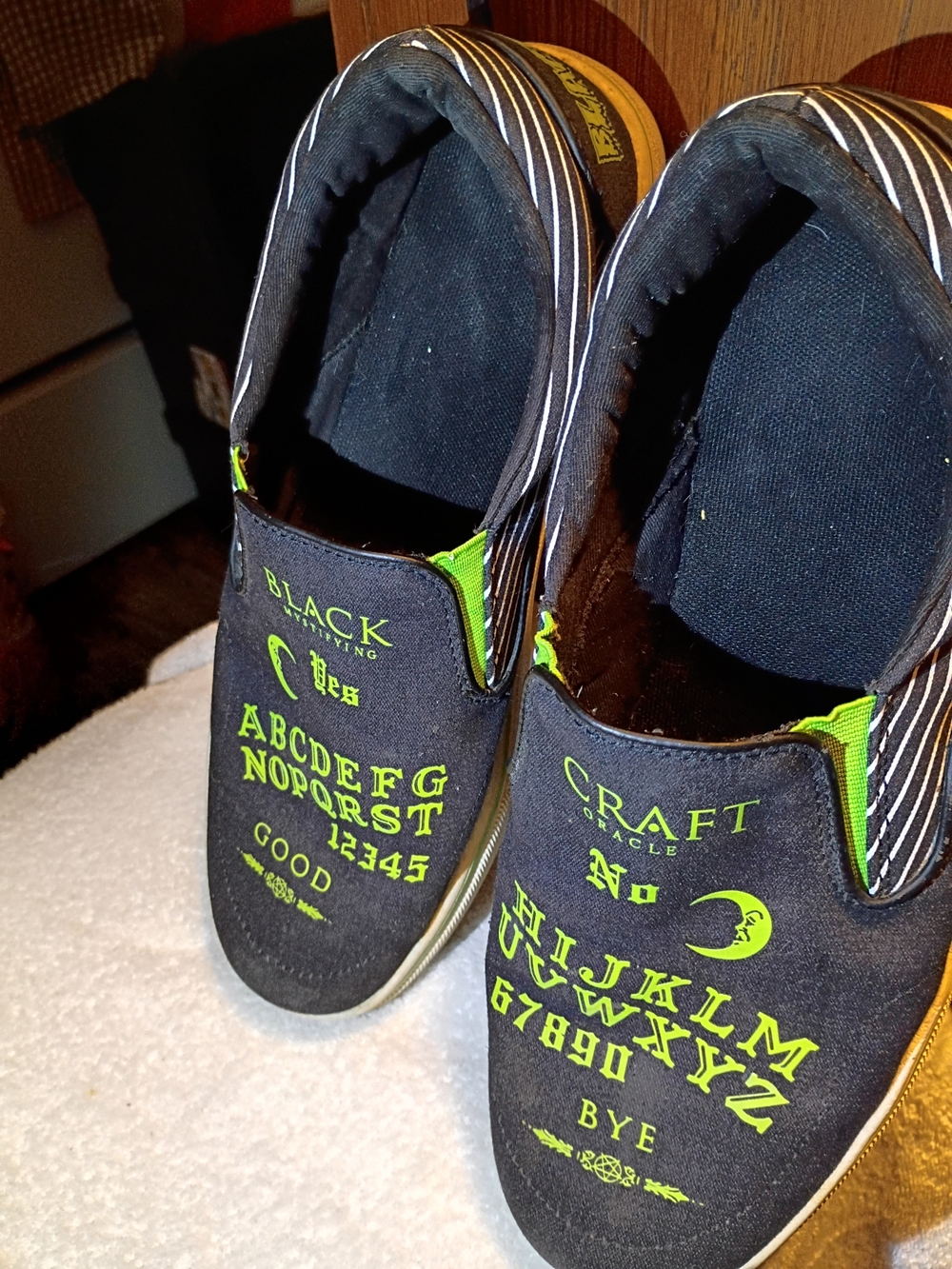 Craft Black Slip-On Sneakers with Neon Green Lettering